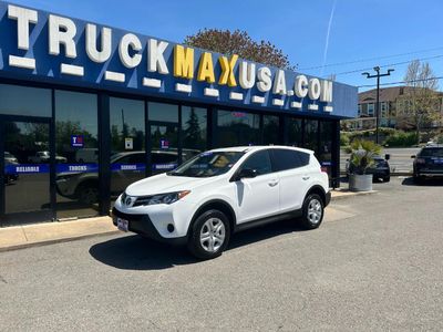 2015 Toyota RAV4 in White — front three-quarter view