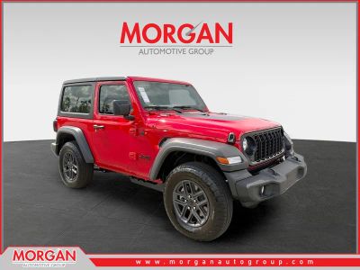 2026 Jeep Wrangler Sport in Red — front three-quarter view