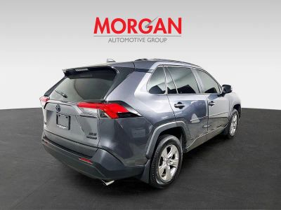 2023 Toyota RAV4 Hybrid — rear three-quarter view