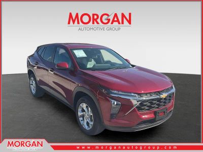 2024 Chevrolet Trax LS in Crimson Metallic — front three-quarter view