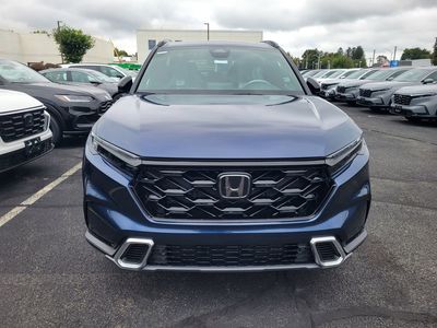 2026 Honda CR-V Hybrid Sport Touring — rear three-quarter view