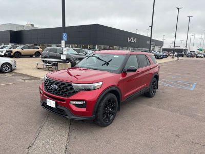 2023 Ford Explorer ST-Line in Rapid Red Metallic Tinted Clearcoat — front three-quarter view
