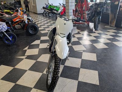 2026 Kawasaki KLX140R — rear three-quarter view