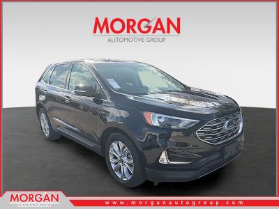 2022 Ford Edge Titanium in Black Metallic — front three-quarter view