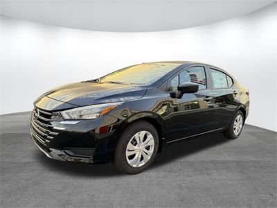 2025 Nissan Versa 1.6 S in Super Black — front three-quarter view