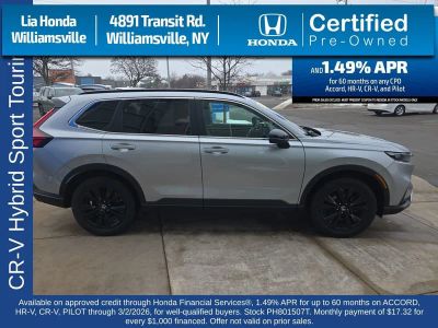 2023 Honda CR-V Hybrid Sport Touring — rear three-quarter view