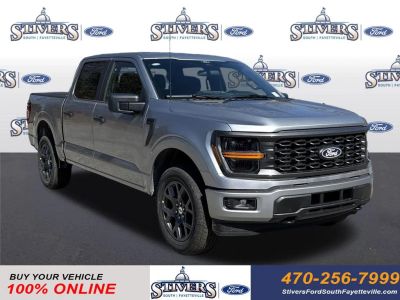 2026 Ford F-150 STX in Iconic Silver Metallic — front three-quarter view