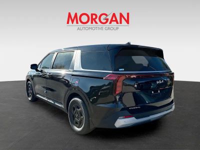 2026 Kia Carnival — rear three-quarter view