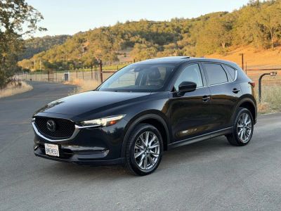 2019 Mazda CX-5 in Charcoal — front three-quarter view