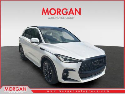 2023 INFINITI QX50 SPORT in Radiant White — front three-quarter view