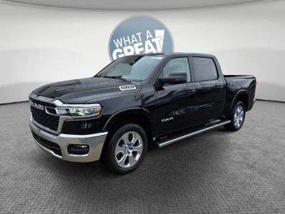 2026 RAM 1500 Big Horn/Lone Star in Diamond Black Crystal Pearlcoat — front three-quarter view