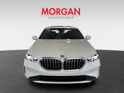2025 BMW 5 Series — rear three-quarter view