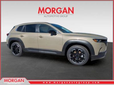 2026 Mazda CX-50 2.5 S Meridian Edition in Zircon Sand Metallic — front three-quarter view