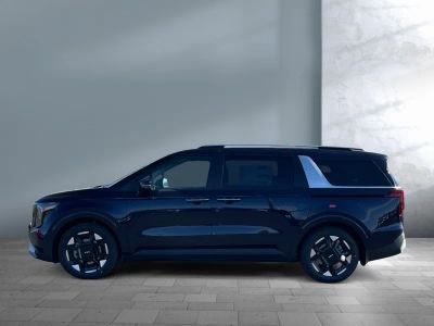 2026 Kia Carnival — rear three-quarter view