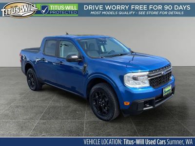 2023 Ford Maverick XLT in Blue Metallic — front three-quarter view