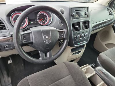 2013 Dodge Grand Caravan — side profile view