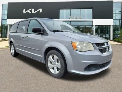 2013 Dodge Grand Caravan SE in Billet Silver — front three-quarter view