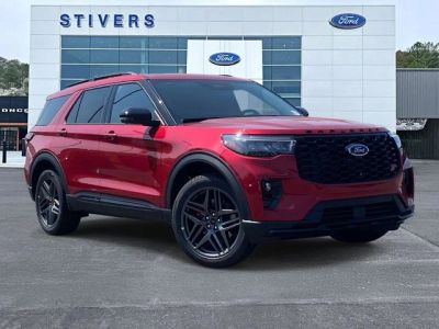 2026 Ford Explorer ST in Rapid Red Metallic Tinted Clearcoat — front three-quarter view