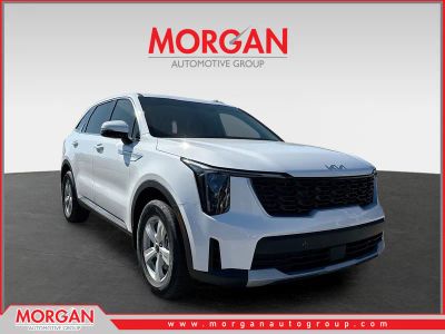 2026 Kia Sorento LX in Glacial White Pearl — front three-quarter view