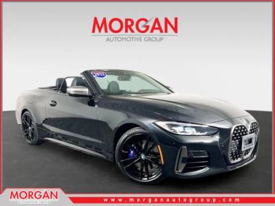 2023 BMW 4 Series M440i xDrive in Black — front three-quarter view