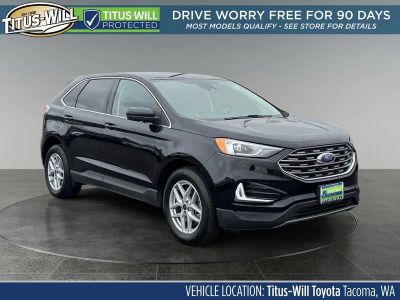 2022 Ford Edge SEL in Black Metallic — front three-quarter view