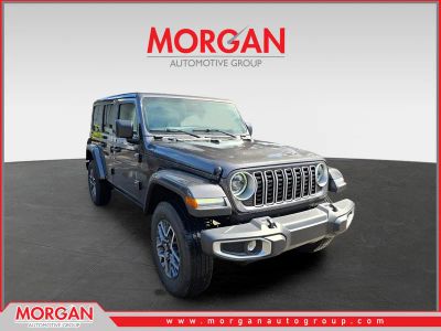 2025 Jeep Wrangler Sahara in Granite Crystal Metallic Clearcoat — front three-quarter view