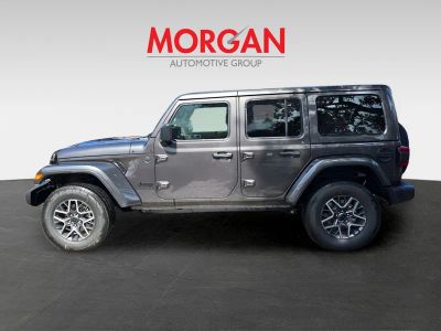 2025 Jeep Wrangler — rear three-quarter view