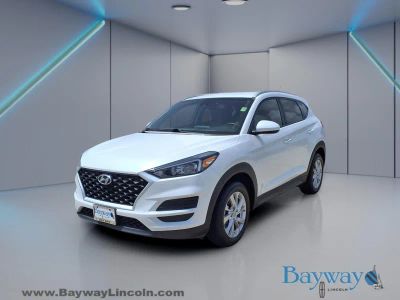 2021 Hyundai Tucson — rear three-quarter view