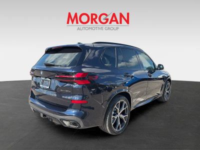 2026 BMW X5 — rear three-quarter view