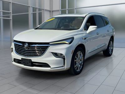 2023 Buick Enclave Essence in Summit White — front three-quarter view