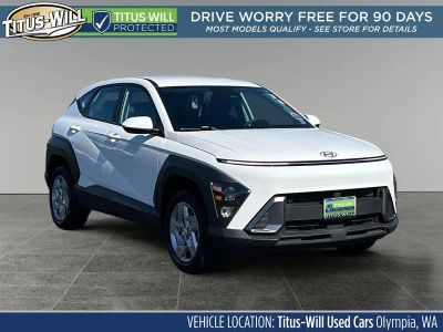 2025 Hyundai Kona SE in Atlas White — front three-quarter view