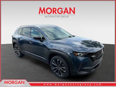 2026 Mazda CX-50 2.5 S Premium in Ingot Blue Metallic — front three-quarter view