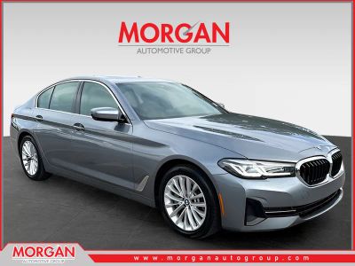 2021 BMW 5 Series 530i in Bluestone Metallic — front three-quarter view