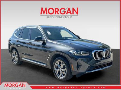 2023 BMW X3 sDrive30i in Dark Graphite Metallic — front three-quarter view