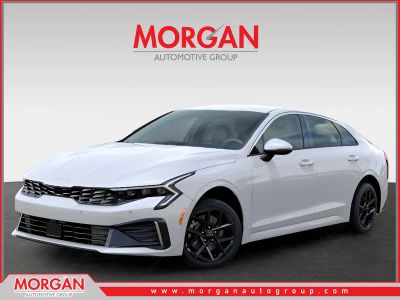 2026 Kia K5 LXS in Snow White Pearl — front three-quarter view