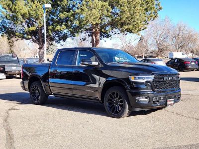 2026 RAM 1500 RAM 1500 LIMITED CREW CAB 4X4 5'7' BOX in Diamond Black Crystal Pearl-Coat Exterior Paint — front three-quarter view