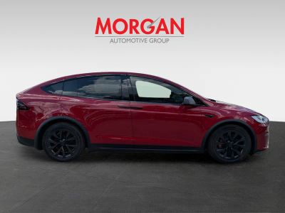 2022 Tesla Model X — rear three-quarter view