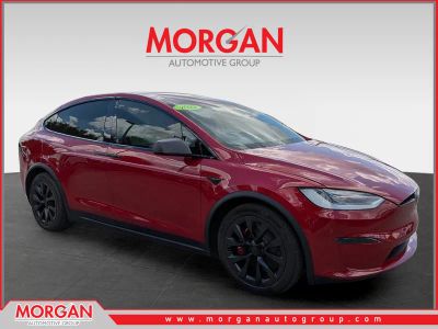 2022 Tesla Model X Plaid in Red Multi-Coat — front three-quarter view