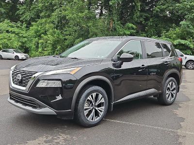 2023 Nissan Rogue — rear three-quarter view
