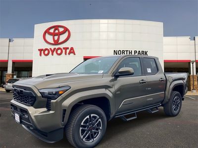 2026 Toyota Tacoma TRD Sport in Bronze Oxide — front three-quarter view