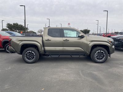 2026 Toyota Tacoma — rear three-quarter view