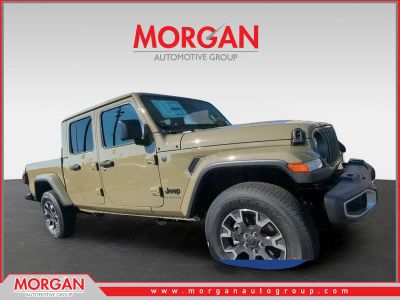2026 Jeep Gladiator Sahara in Green — front three-quarter view