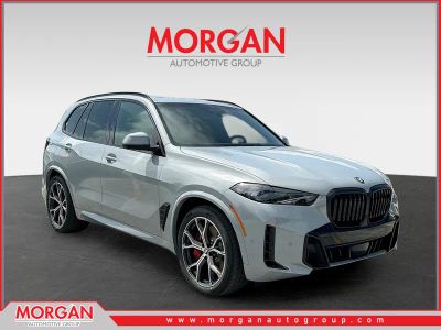 2026 BMW X5 xDrive50e in Brooklyn Grey Metallic — front three-quarter view
