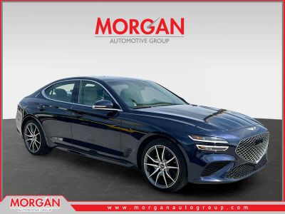 2023 Genesis G70 2.0T in Blue — front three-quarter view