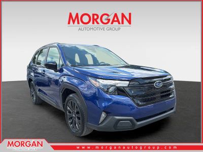 2026 Subaru Forester Sport in Sapphire Blue Pearl — front three-quarter view