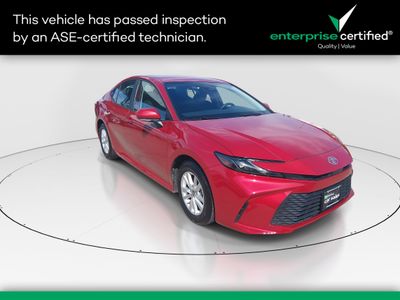 2025 Toyota Camry LE — front three-quarter view