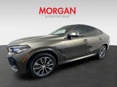 2022 BMW X6 — rear three-quarter view