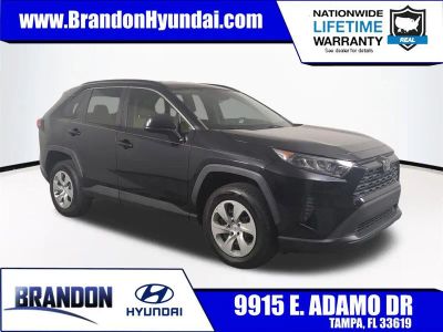 2019 Toyota RAV4 LE in Black — front three-quarter view