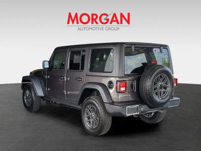 2026 Jeep Wrangler — rear three-quarter view