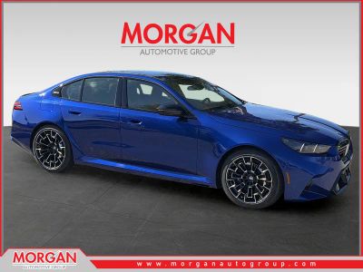 2026 BMW M5 Base in Blue — front three-quarter view